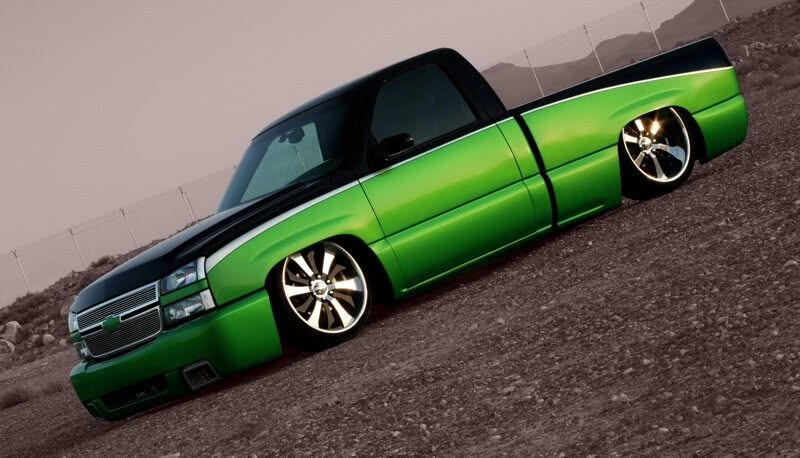 Custom orange Dodge Ram lowrider truck